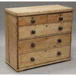 A Victorian pine chest of two short and three long drawers, on block feet, height 92cm, width 105cm,