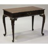 A late 19th century Chippendale style mahogany side table, the inverted breakfront top with a carved