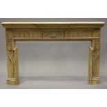 An early 20th century pine fire surround with carved and fluted decoration, height 116cm, width