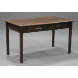 A 20th century oak desk, fitted with two frieze drawers, on block legs, height 77cm, width 135cm,