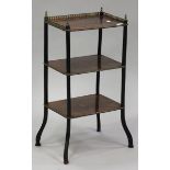 A late Victorian walnut and ebonized three-tier étagère with inlaid decoration and gilt metal