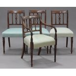 A set of four George IV mahogany bar back dining chairs, comprising a carver chair and three