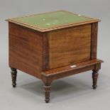 An early Victorian figured mahogany step commode, the hinged lid and pull-out step inset with