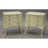 A pair of late 20th century Louis XV style painted bedside chests of three drawers, raised on