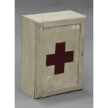 A 20th century wall mounted first aid cabinet, height 41cm, width 31cm.Buyer’s Premium 29.4% (