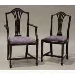 A set of six 20th century Victorian style mahogany dining chairs, comprising two carver and four