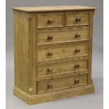 A modern pine chest of two short and four long drawers, on a plinth base, height 116cm, width 102cm,