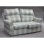 A Marks & Spencer two seat sofa, upholstered in check fabric, height 84cm, length 174cm.Buyer’s