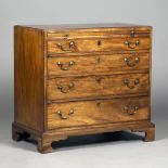 A George III mahogany bachelor's chest of four graduated long drawers, the crossbanded top above a