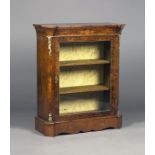 A mid-Victorian burr walnut pier cabinet, inlaid with foliate scrolls and applied with gilt metal