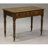 A Victorian stained pine side table, fitted with two drawers, raised on turned legs and castors,