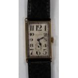 A Benson 9ct gold rectangular cased gentleman's wristwatch, the circular jewelled lever movement
