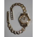 An Omega De Ville Automatic 18ct gold circular cased lady's wristwatch, the signed jewelled movement