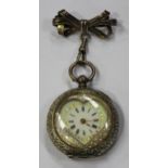 A silver cased keywind open-faced fob watch with a jewelled Swiss cylinder movement, the inner and