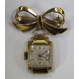 A Tatton 9ct gold rectangular shaped lady's wristwatch, Birmingham 1950, converted for wear as a