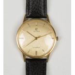 A Cyma Cymaflex 18ct gold circular cased gentleman's wristwatch, the signed gilt dial with gilt