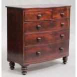 An early Victorian mahogany bowfront chest of two short and three long drawers, on turned feet,