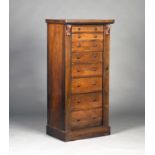 A mid-Victorian rosewood Wellington chest of eight graduated drawers, on a plinth base, height
