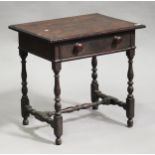 A Victorian oak side table, fitted with a frieze drawer, raised on turned and block legs, height