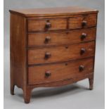 A Victorian mahogany bowfront chest of two short and three long drawers, raised on bracket feet,