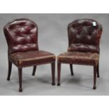 A set of eight early 20th century mahogany dining chairs, upholstered in buttoned claret leather,