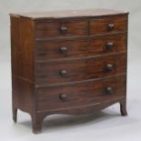 A George III mahogany bowfront chest of two short and three long drawers, on splayed bracket feet,