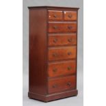 An Edwardian walnut tallboy, fitted with two short and five long drawers, on a plinth base, height