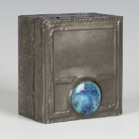 An Arts and Crafts pewter-mounted cedar-lined box, the removable lid inset with a Ruskin blue/
