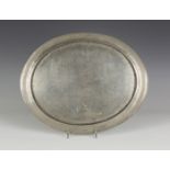 A Liberty & Co 'Tudric' pewter oval tray, model number '0551', with overall hammered decoration,