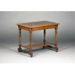 A late Victorian Arts and Crafts style oak and parquetry veneered two-tier centre table, the moulded