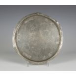 A Liberty & Co 'Tudric' pewter circular salver, designed by Archibald Knox, model number '0716', the