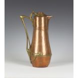 A WMF copper and brass mounted tappit lid water jug, the body with an applied foliate handle,