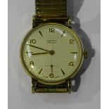 A Vertex Revue 9ct gold circular cased gentleman's wristwatch, the signed silvered dial with gilt