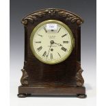 A William IV rosewood mantel timepiece with brass single fusee movement, the painted circular dial