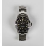 A Rolex Oyster Perpetual Date Sea-Dweller steel gentleman's bracelet wristwatch, model 1665/0, the