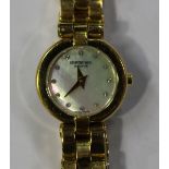 A Raymond Weil gilt metal lady's bracelet wristwatch, the signed mother-of-pearl dial with