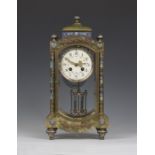 A late 19th century French onyx, brass and champlevé enamel four glass mantel clock with eight day