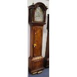 A George III figured mahogany longcase clock with eight day movement striking on a bell, the 12-inch