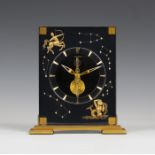 A Jaeger-LeCoultre astrological lucite and gilt brass mantel timepiece, the clear and black