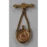 A gold mounted and pink enamelled lady's pendant watch, with an unsigned jewelled cylinder movement,