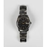A Rolex Oysterdate circular steel cased gentleman's wristwatch, the signed black dial with baton