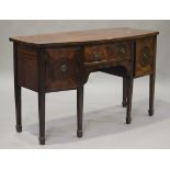 A late 19th century George III style mahogany bowfront sideboard, fitted with a drawer and two