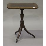 A 19th century mahogany rectangular tip-top wine table with ebony stringing, raised on a turned