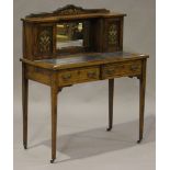 A late Victorian rosewood and foliate inlaid lady's writing table, the gallery back inset with a