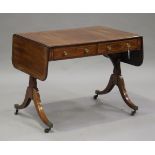 A Regency mahogany and satinwood crossbanded sofa table with boxwood line inlaid decoration,