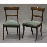 A set of six Regency mahogany bar back dining chairs, the drop-in seats on sabre legs, width 47cm.