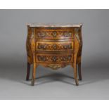 An early 20th century Louis XV style kingwood commode of bombé form, the rouge marble top above