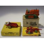 A Dinky Supertoys No. 563 heavy tractor, finished in orange with green wheels and tracks, a No.