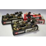 Two Corgi No. 191 Lotus Formula 1 racing cars and a No. 191 McLaren Formula 1 racing car, all