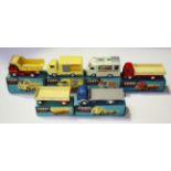 Five Corgi Toys commercial vehicles, comprising a No. 407 Smith's 'Karrier Bantam' Mobile Shop, a